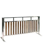 The Ascot Timber and Stainless Steel Fence features vertical wooden slats within a metal frame, standing on flat metal bases, ideal for restricting access or creating enclosures.