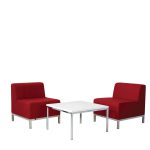 Two red armchairs with metal legs are positioned on either side of a white square table, all featuring metal legs, against a white background. This setting is part of the Lucca Package 2.
