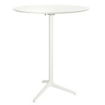 The Ypsilon Round Dry Bar White features a minimalist design with a thin top and three-legged pedestal base.