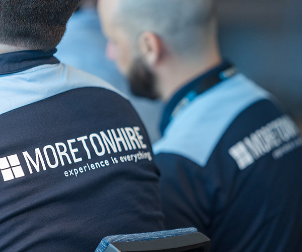 Two individuals wearing 