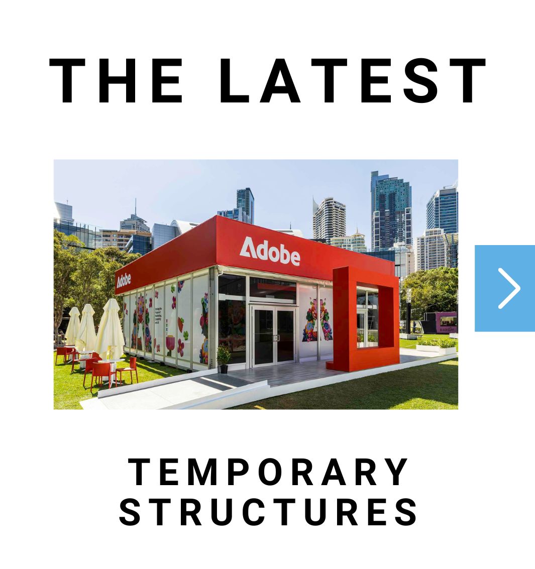 Adobe temporary pavilion with a red doorway on a lawn, city skyline behind, and the headings 'THE LATEST' above the image.