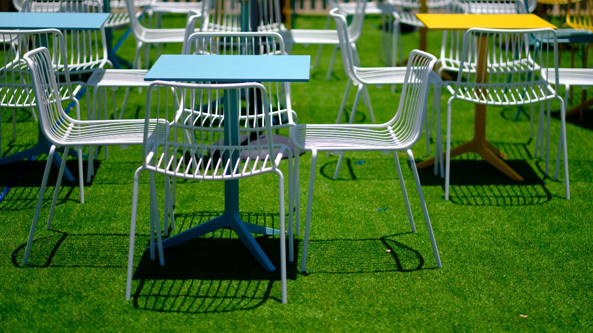 Artificial grass flooring in an event breakout zone