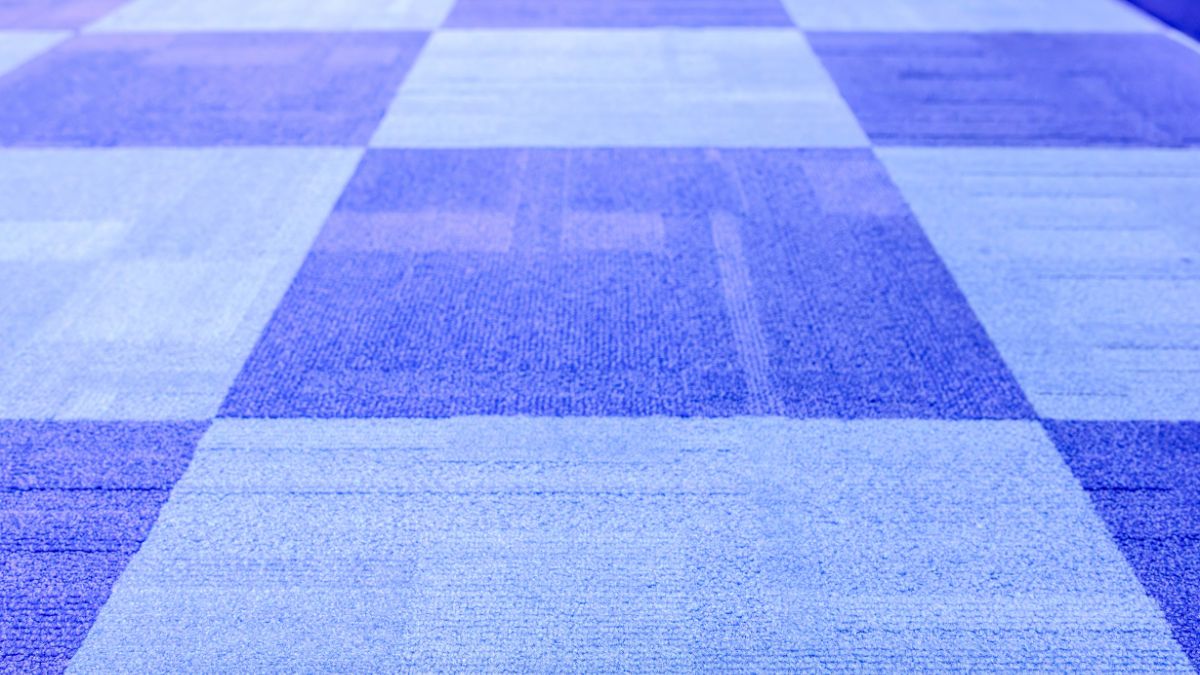 Carpet tiles installed across an exhibition floor